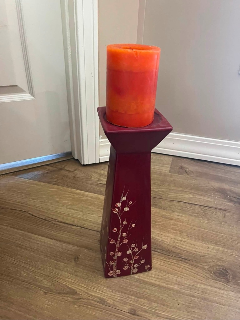 Source Unknown Red Decorative Candle Holder with Orange Candle